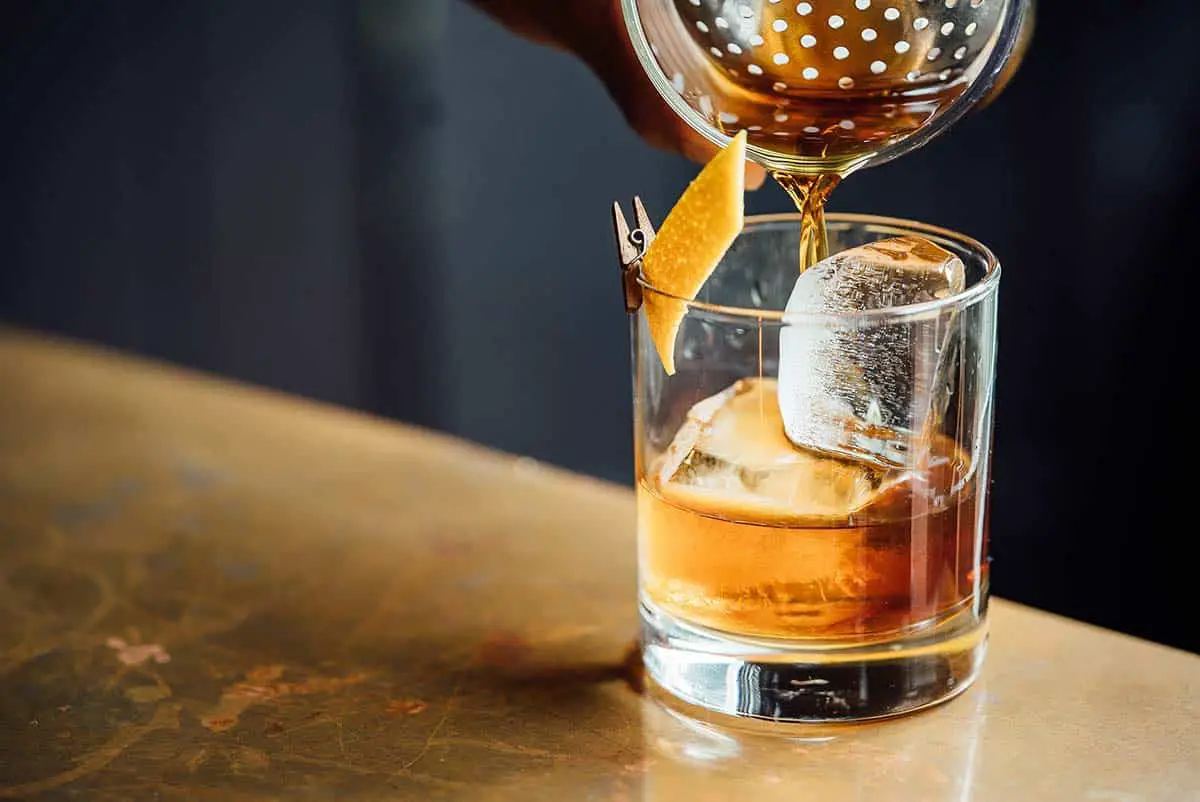 Bartender pouring a cocktail