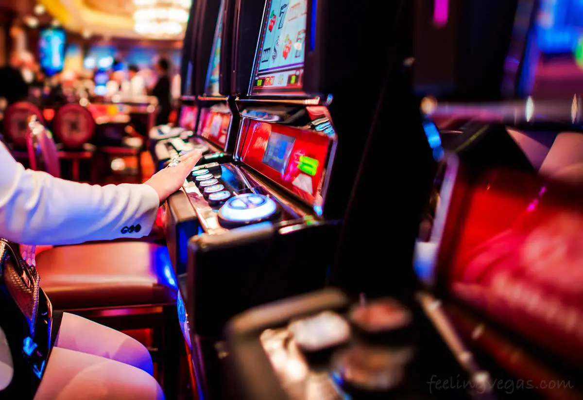 Playing a slot machine in a non-smoking area in casino