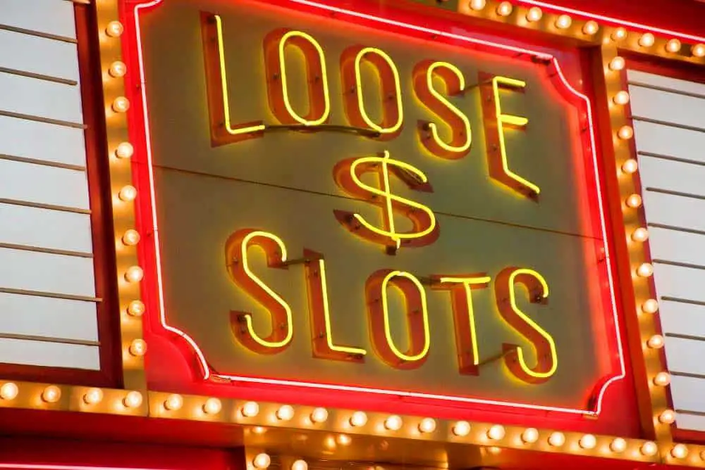 Neon sign indicating loose slot machines in vegas