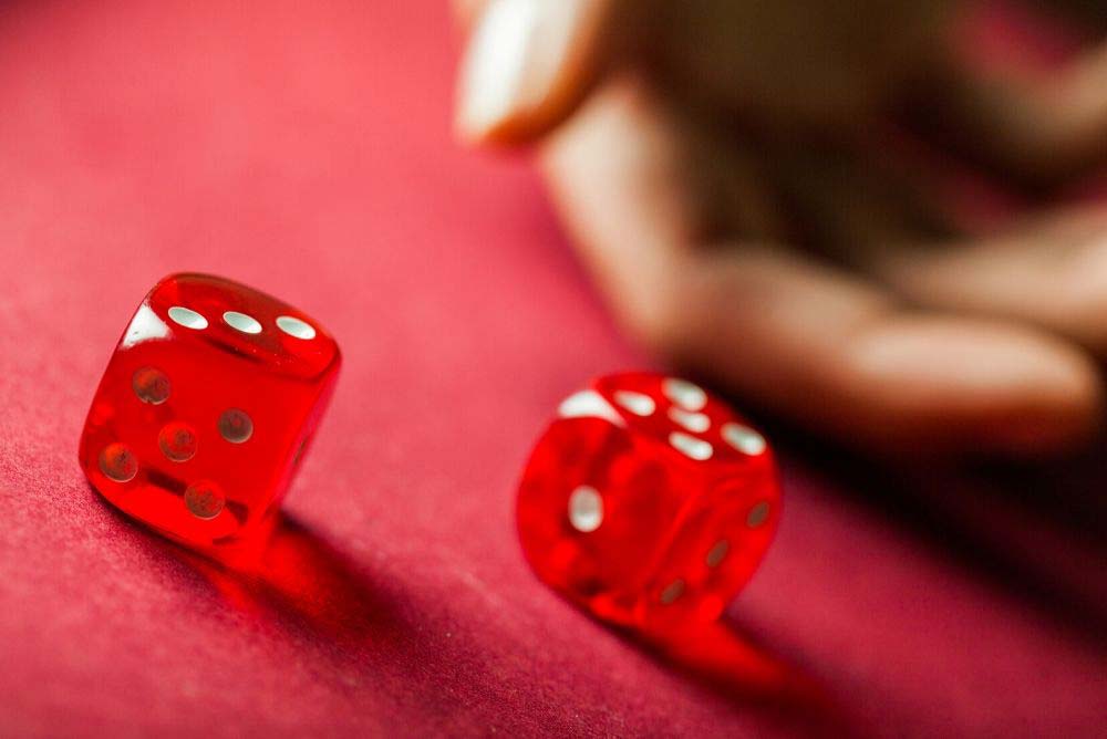 Rolling pair of red dice