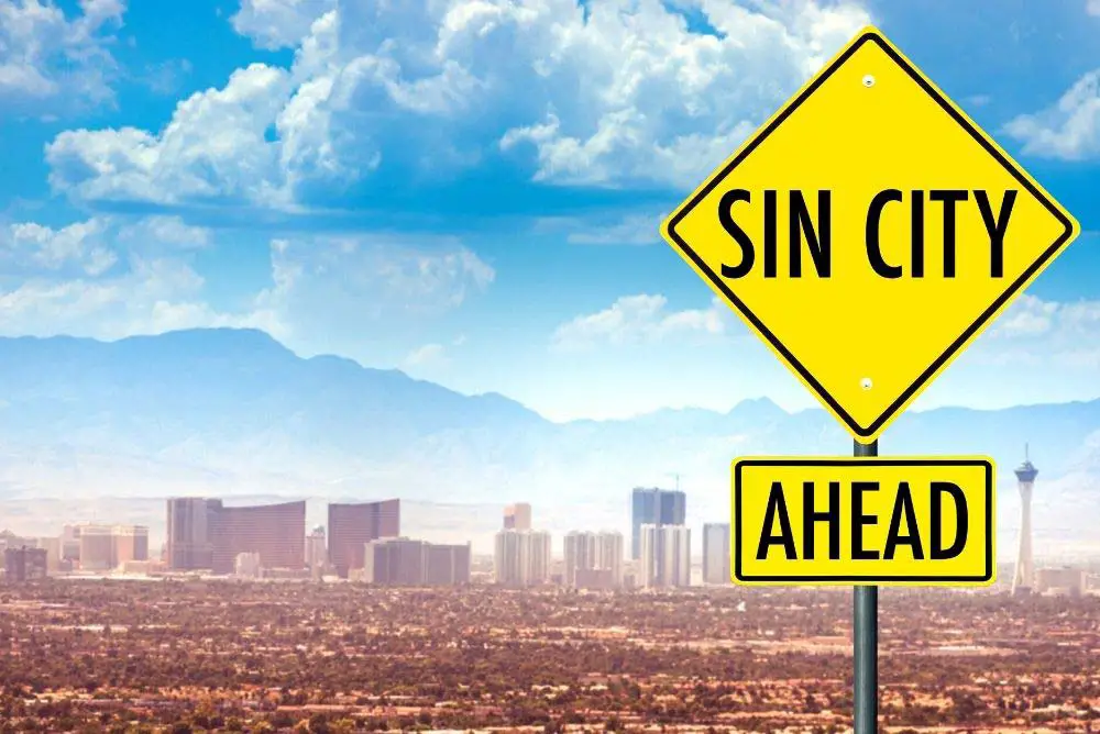 Sin City sign and Las Vegas skyline