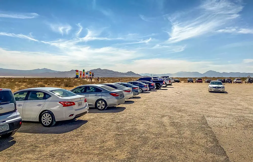 There is a large gravel parking lot at the Seven Magic Mountains near Las Vegas.