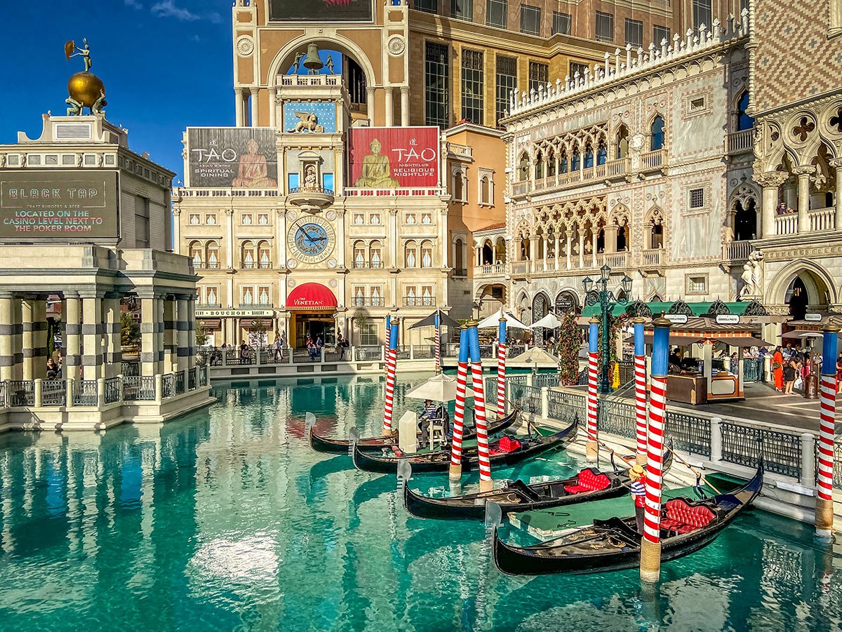 Gondolas and Venetian lagoon in front The Venetian Hotel in Las Vegas.