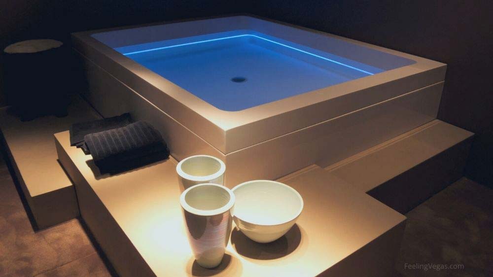 A luxury soaking tub in a hotel room.