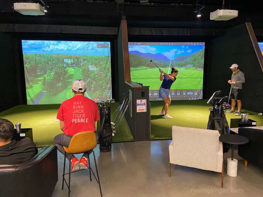 What Is AREA 15 in Las Vegas? (10+ AMAZING Things To See & Do) 7 Simulated golfing bays at Five Iron Golf inside AREA 15.