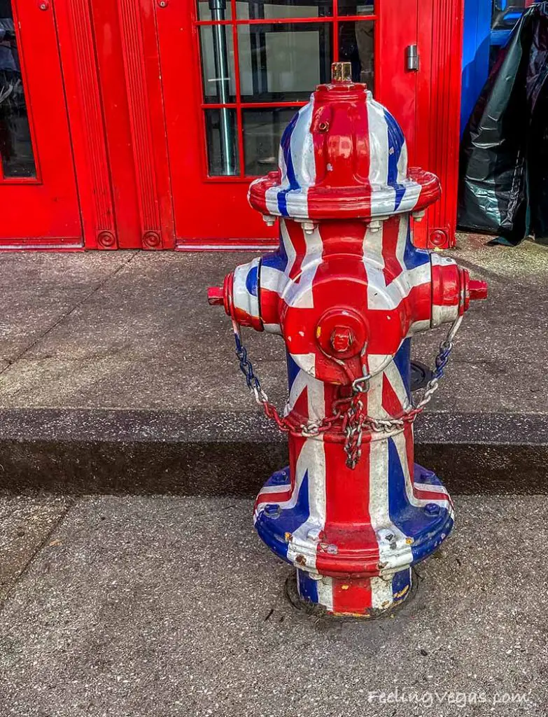 Fire hydrant painted like the British flag in front of Gordon Ramsay Fish & Chips.