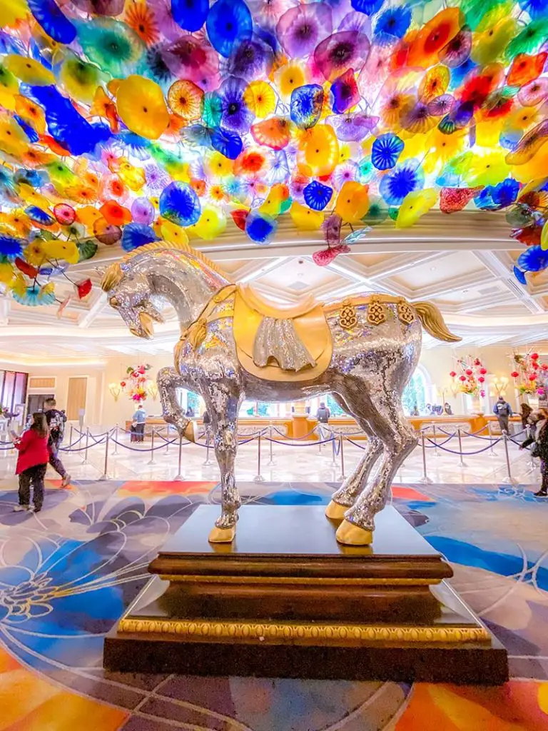 You can often find the mosaic Bellagio Horse underneath the ornate glass ceiling in Bellagio's lobby.
