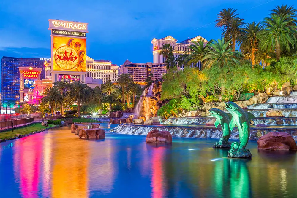 View of the Mirage sign and lake during a walk along the Strip