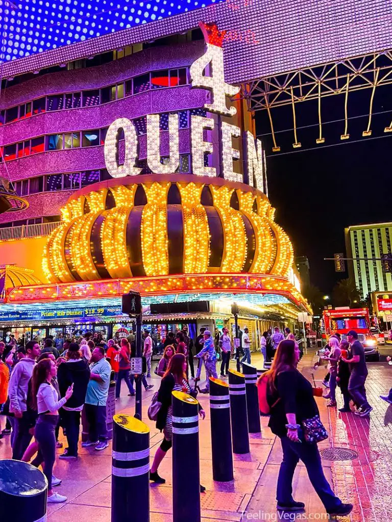 The Four Queens hotel and tourists at the Fremont Street Experience