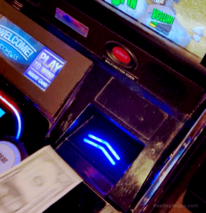 Do Slot Machines in Las Vegas Take Cash? (Answered) 2 Putting cash into a Las Vegas slot machine