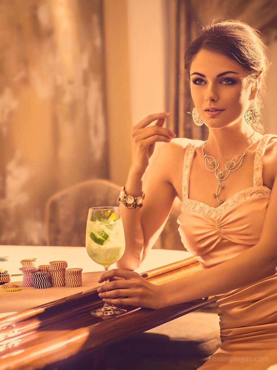 Woman enjoying a Mojito cocktail in a Las Vegas casino