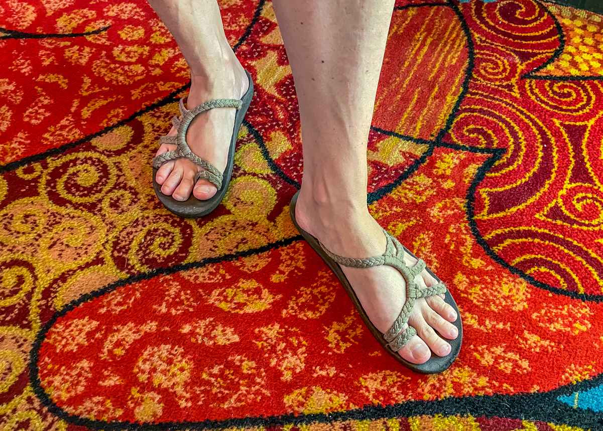 Woman wearing flip flop types sandals inside a Las Vegas casino