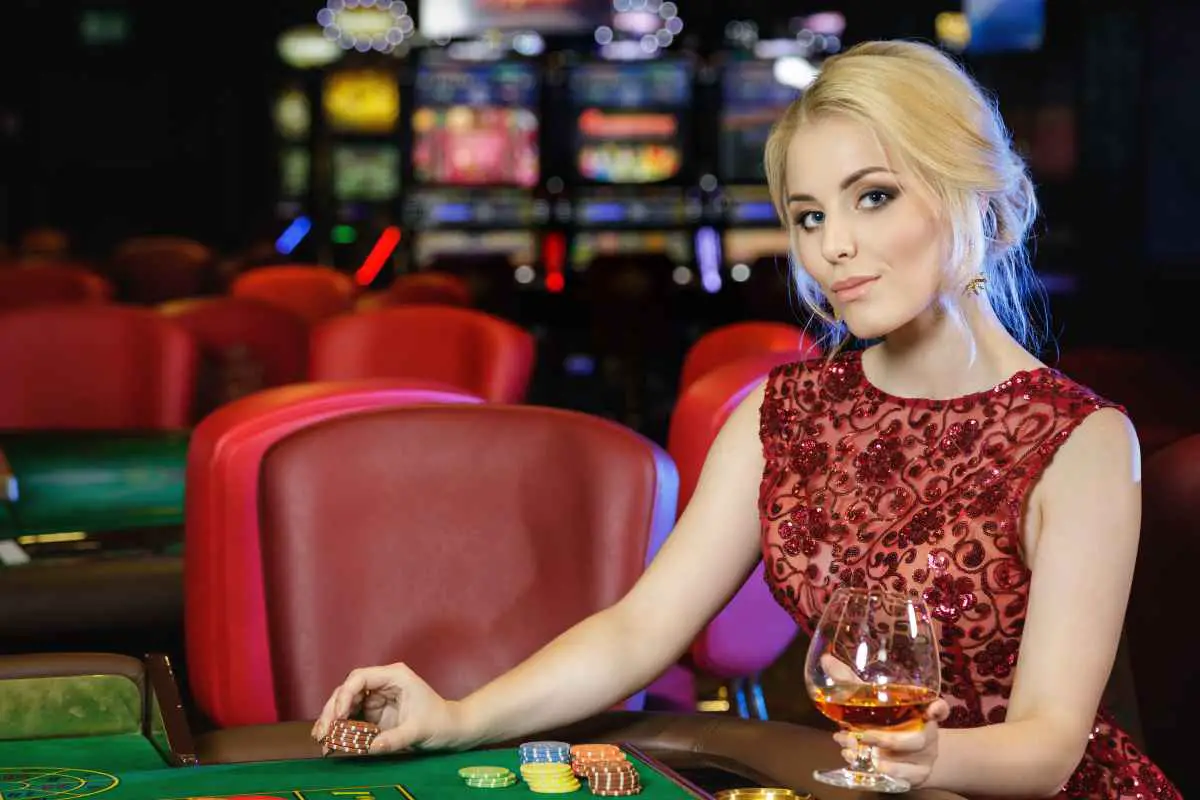 A woman dressed appropriately in a Las Vegas casino at night.