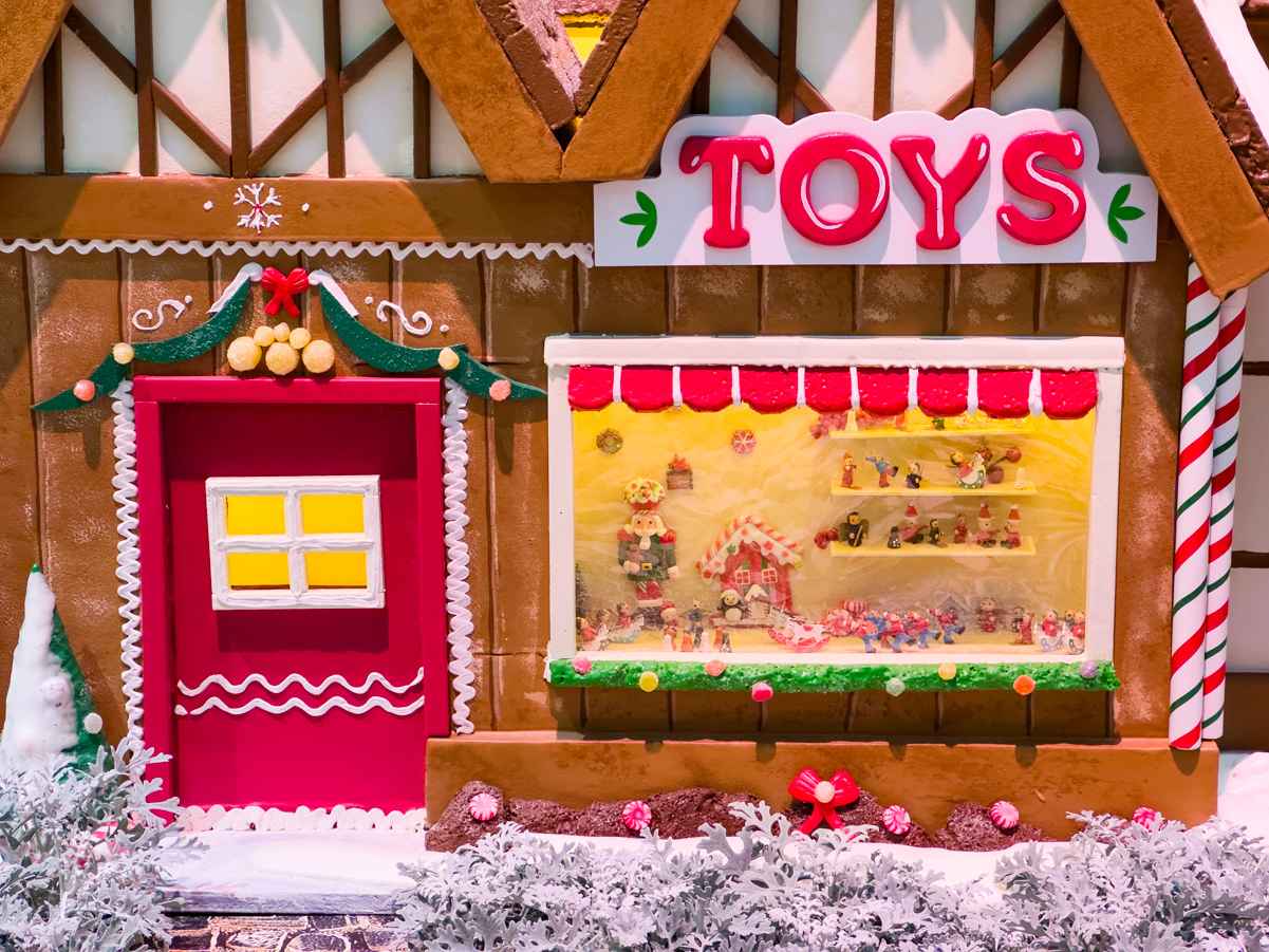 Miniature toys in the window of the toy store at Bellagio Conservatory Christmas display 2022
