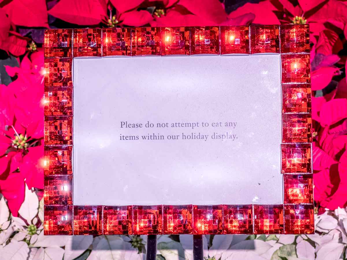 Sign at the Bellagio Conservatory asking visitors not to try and eat any of the items on display, Christmas 2022