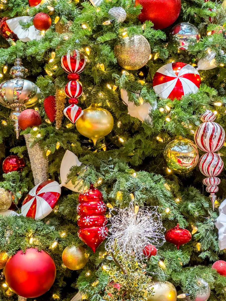 Detail of the ornaments and lights on the Bellagio Garden Christmas tree, 2022