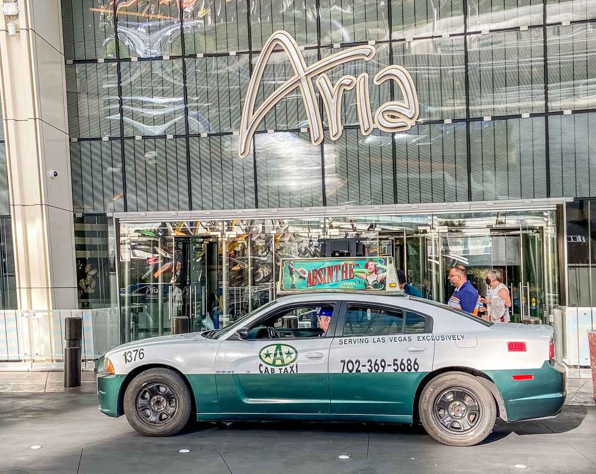 A Las Vegas taxi brings visitors from the airport to Aria hotel