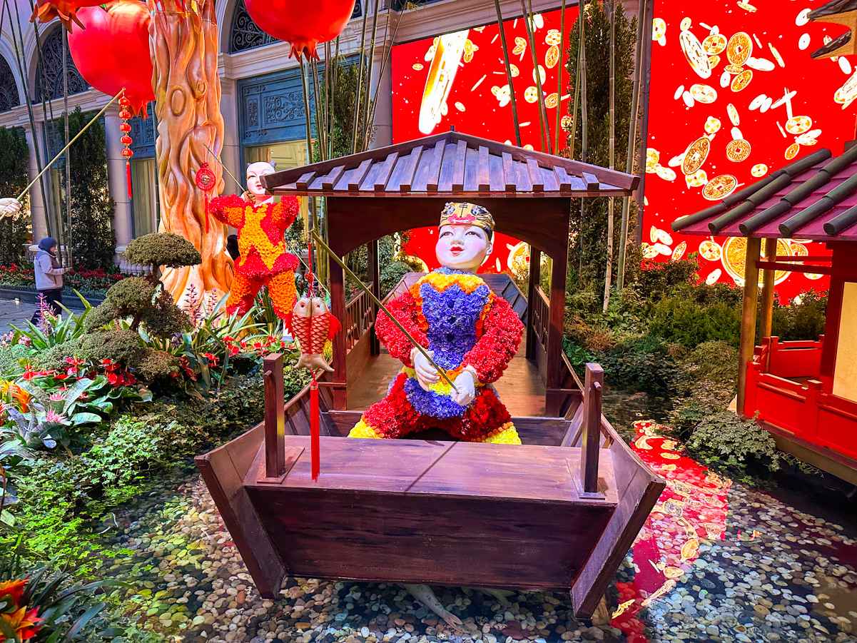 Floral child fishing at Bellagio Conservatory 2023 Lunar New Year