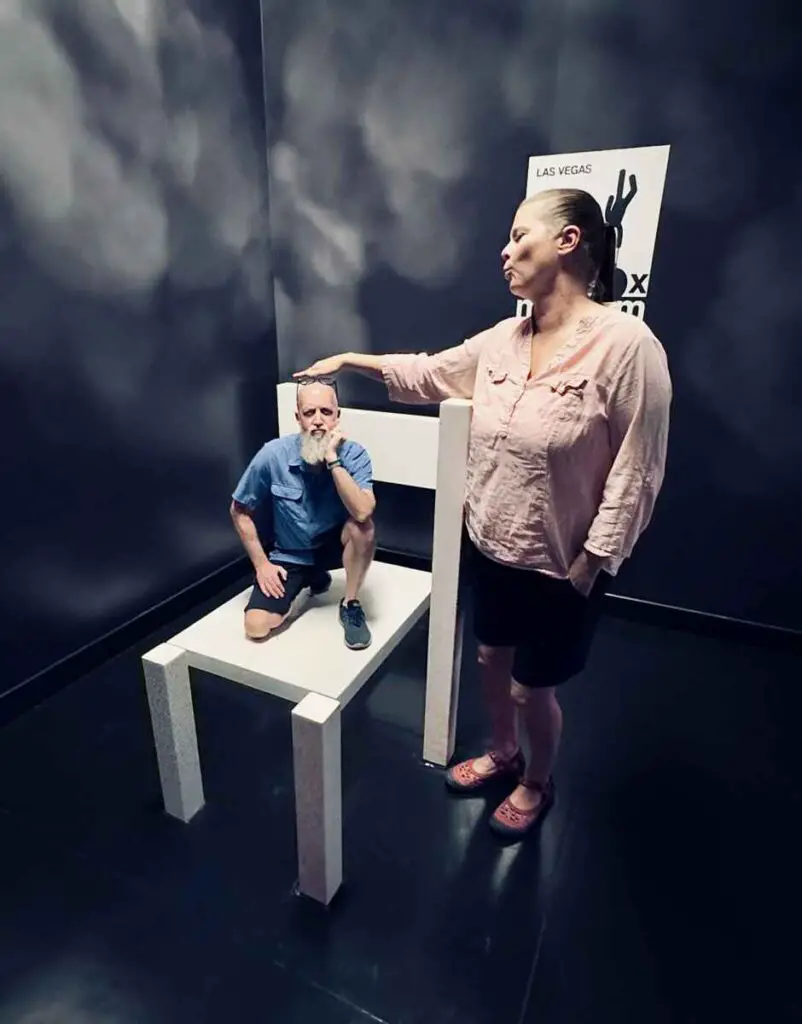 Paradox Museum Las Vegas: Over 90 Mind-Bending Exhibits! 4 Little man sitting in a chair at Paradox Museum Las Vegas