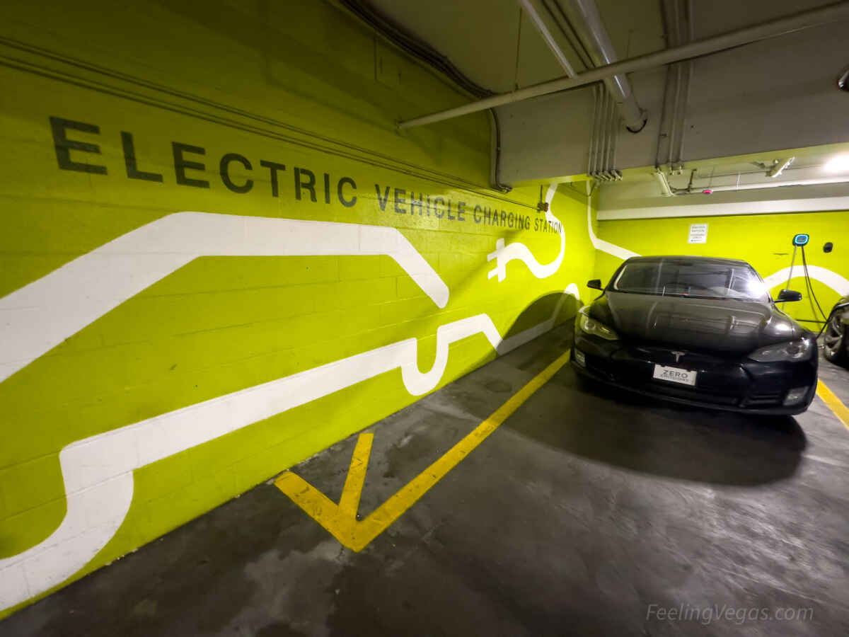 Electric vehicle charging station inside the parking garage at t