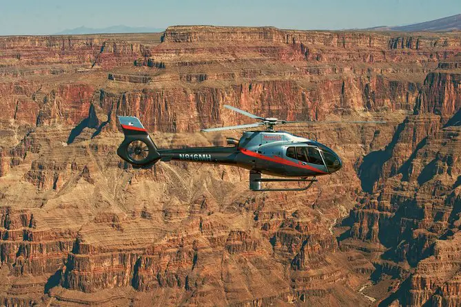 Helicopter flying over the Grand Canyon.